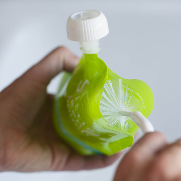 Clean Little Green Pouches with ease using our handy bottle brush